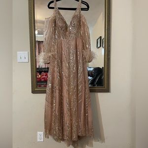 Formal dress,Rose Gold,key hole back,feather sleeves, sequence and mesh .